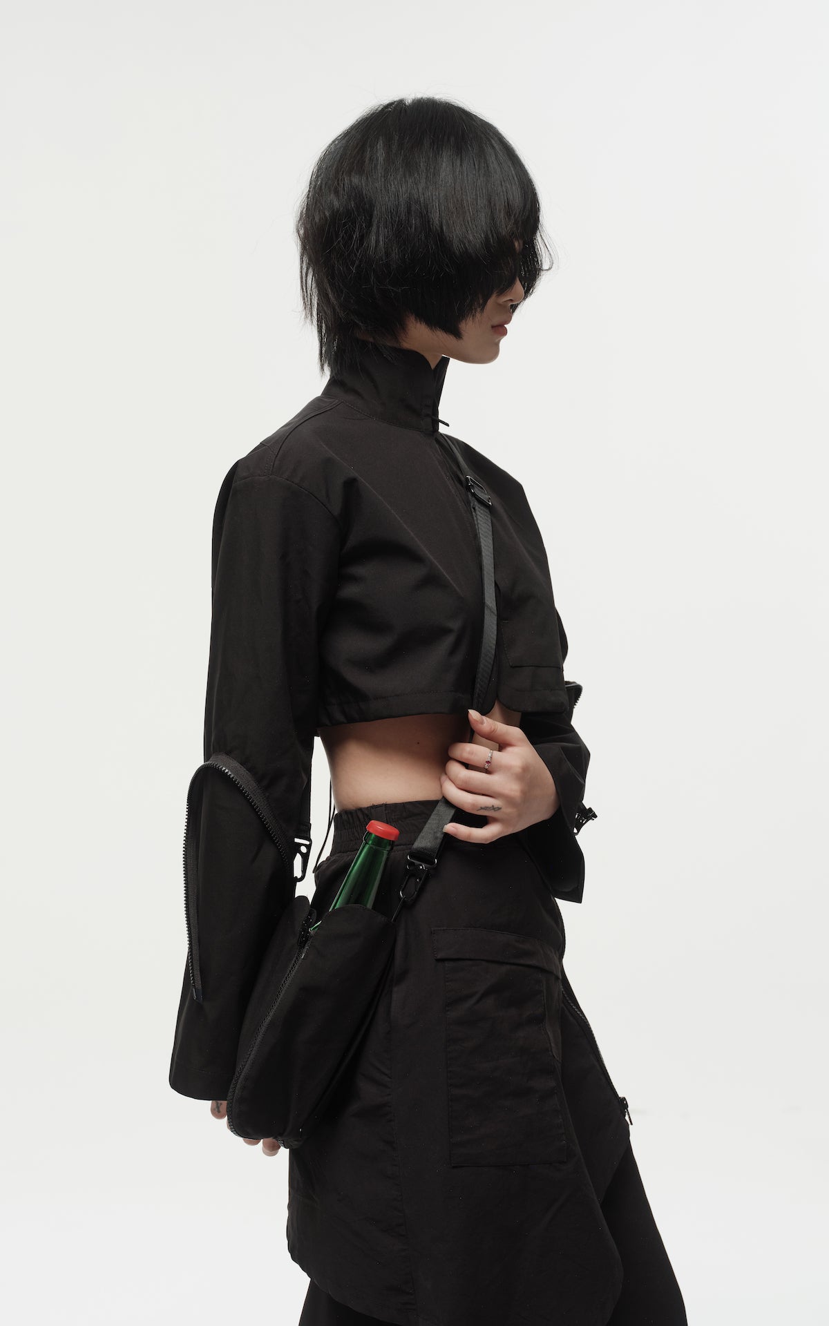 1. "REI" 3L Waterproof Cropped Jacket with Removable Bag / TRJCT W