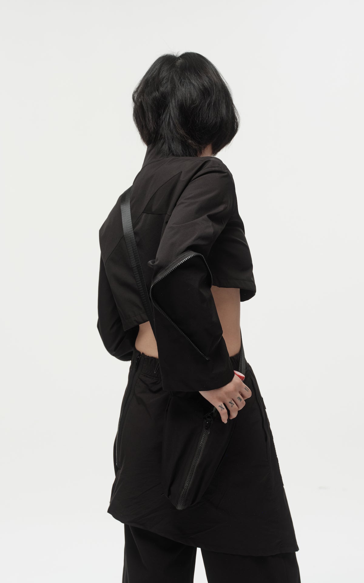 1. "REI" 3L Waterproof Cropped Jacket with Removable Bag / TRJCT W