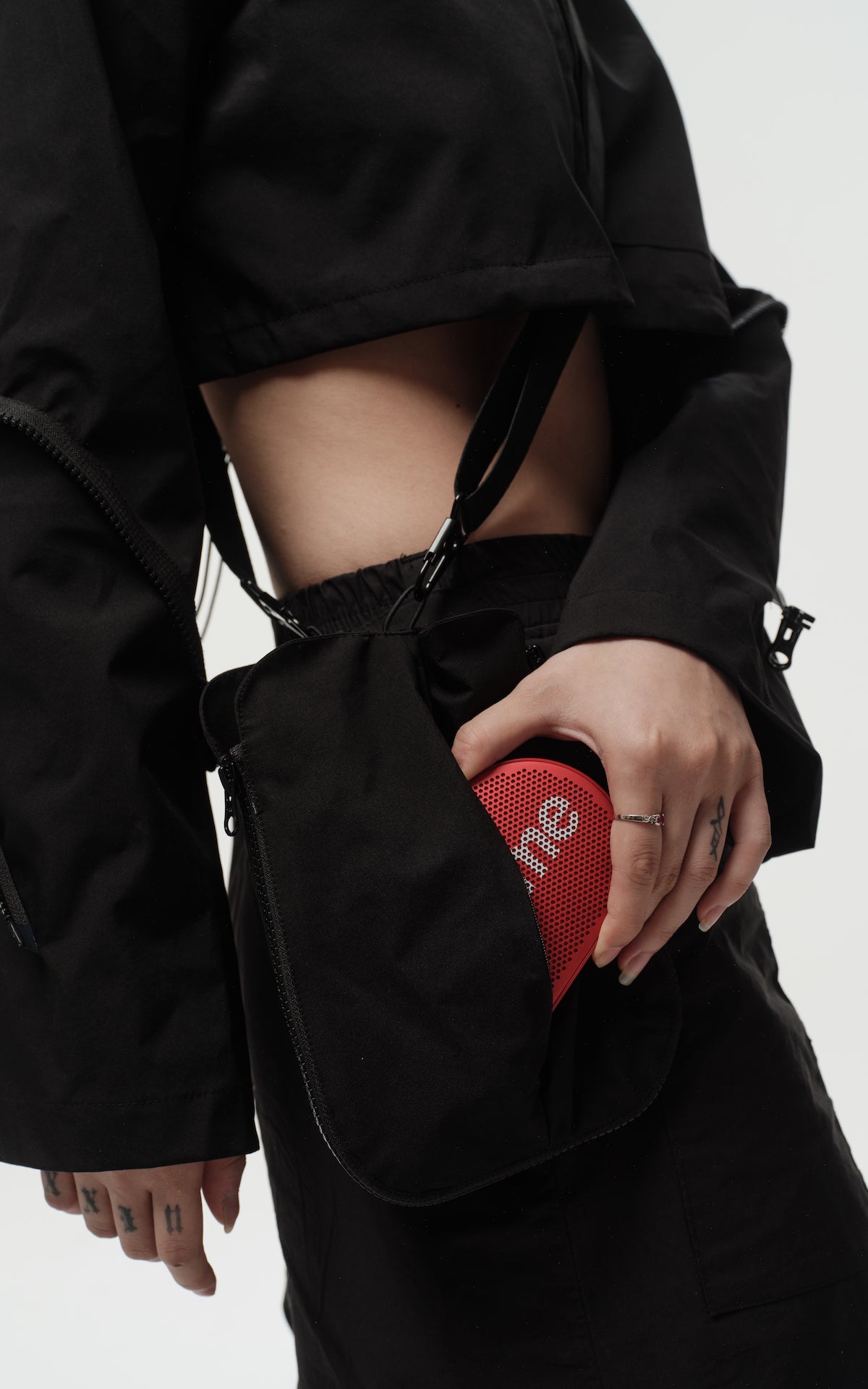 1. "REI" 3L Waterproof Cropped Jacket with Removable Bag / TRJCT W