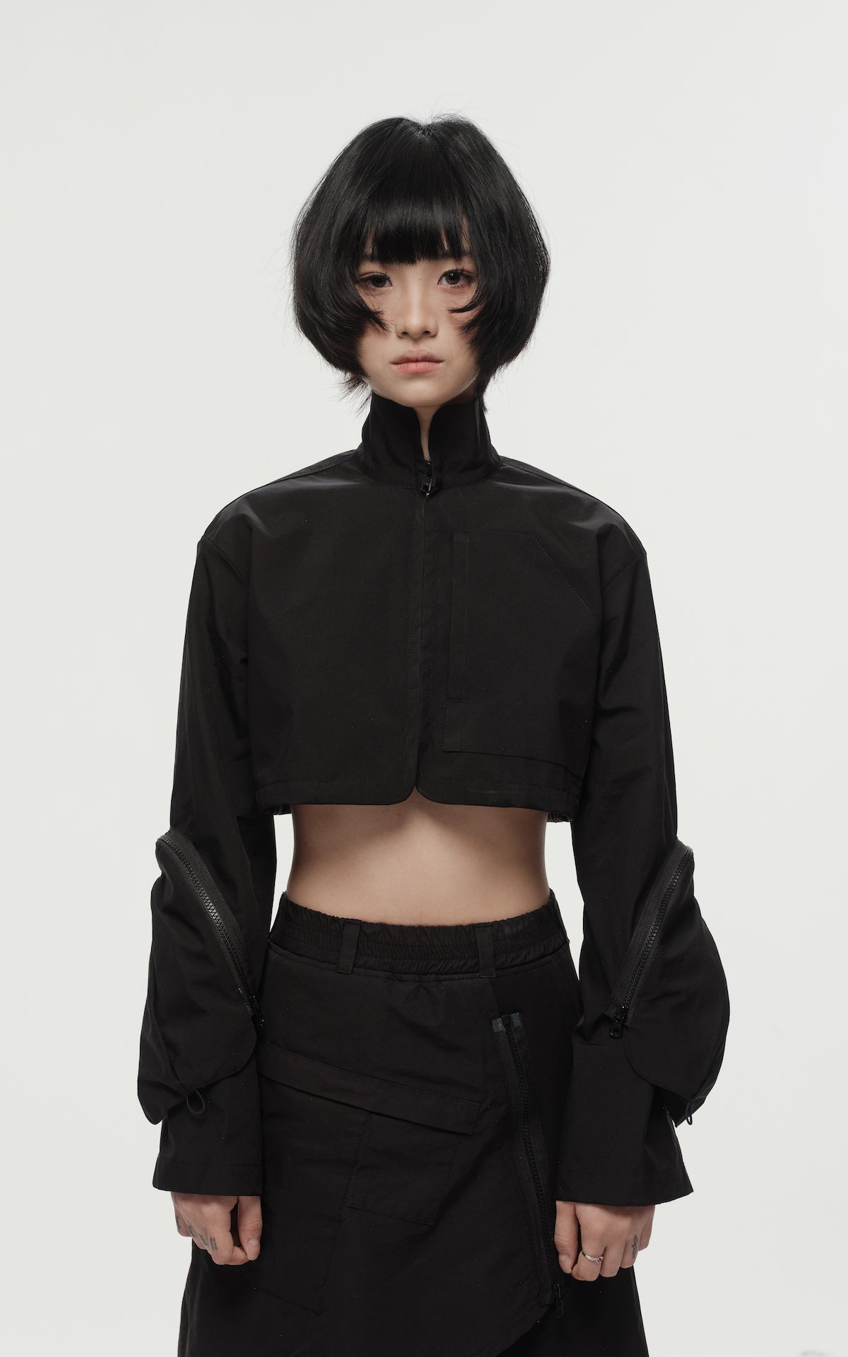 1. "REI" 3L Waterproof Cropped Jacket with Removable Bag / TRJCT W