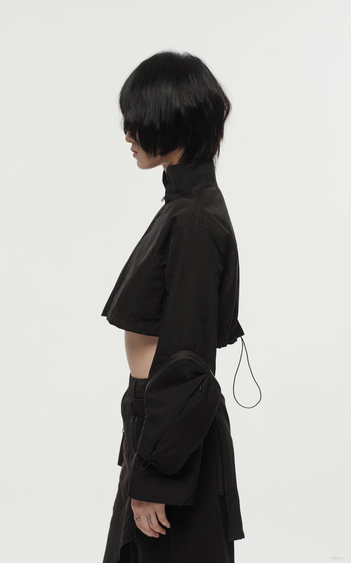 1. "REI" 3L Waterproof Cropped Jacket with Removable Bag / TRJCT W