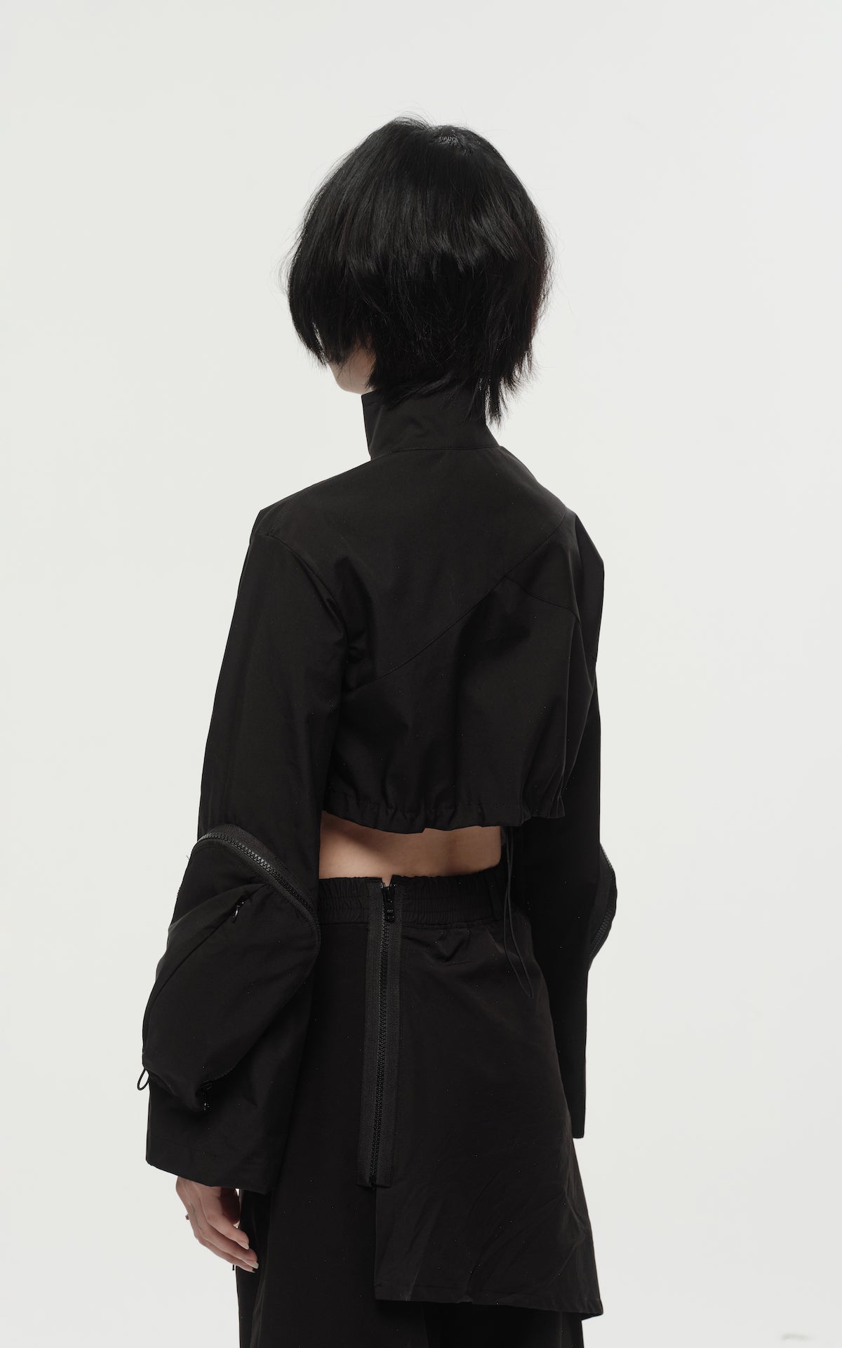 1. "REI" 3L Waterproof Cropped Jacket with Removable Bag / TRJCT W