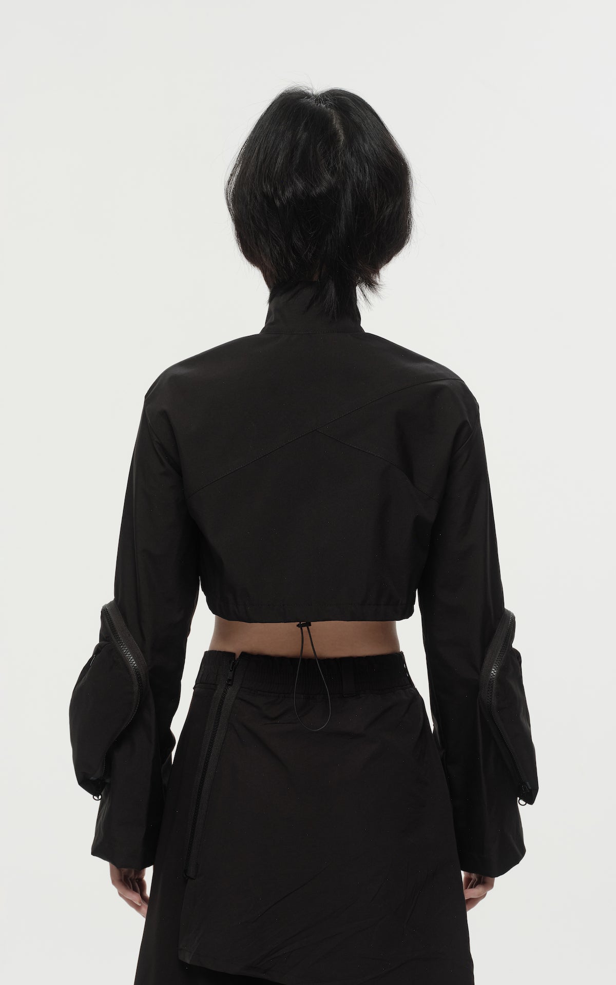 1. "REI" 3L Waterproof Cropped Jacket with Removable Bag / TRJCT W