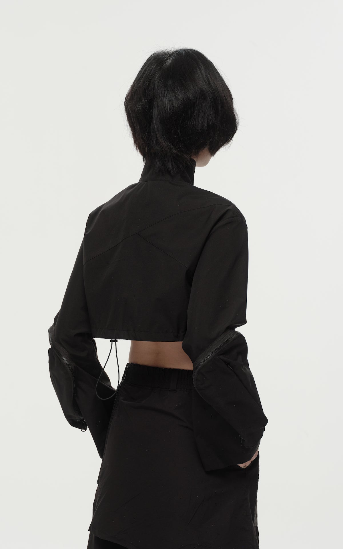 1. "REI" 3L Waterproof Cropped Jacket with Removable Bag / TRJCT W