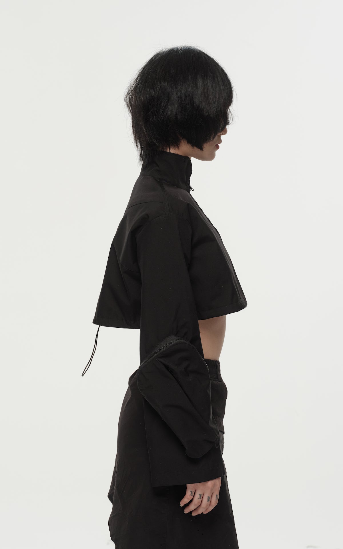 1. "REI" 3L Waterproof Cropped Jacket with Removable Bag / TRJCT W